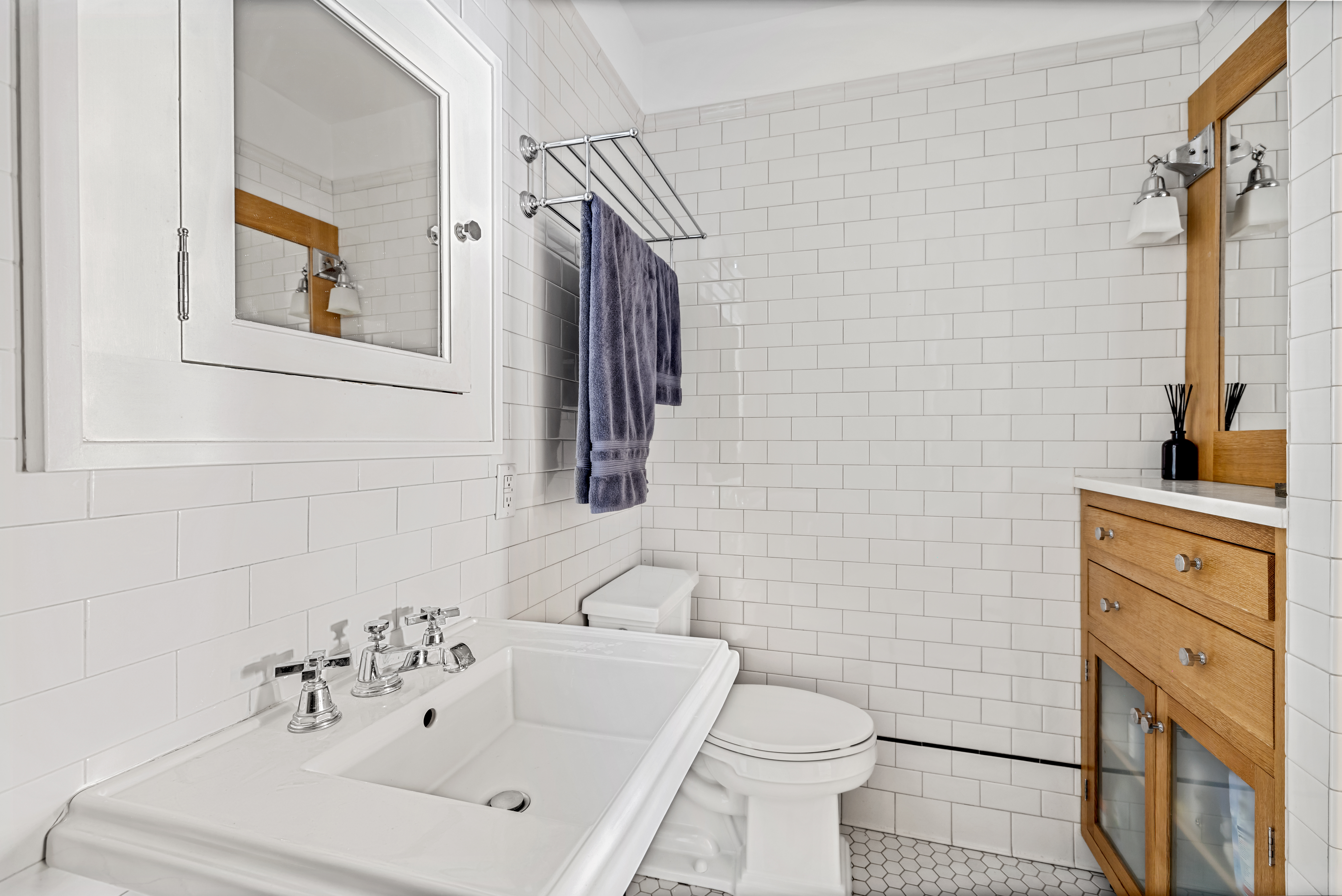 26 Cornelia Street, Unit 12 Manhattan, NY 10014 - Photo 4 of 7 a bathroom with a sink toilet and shower