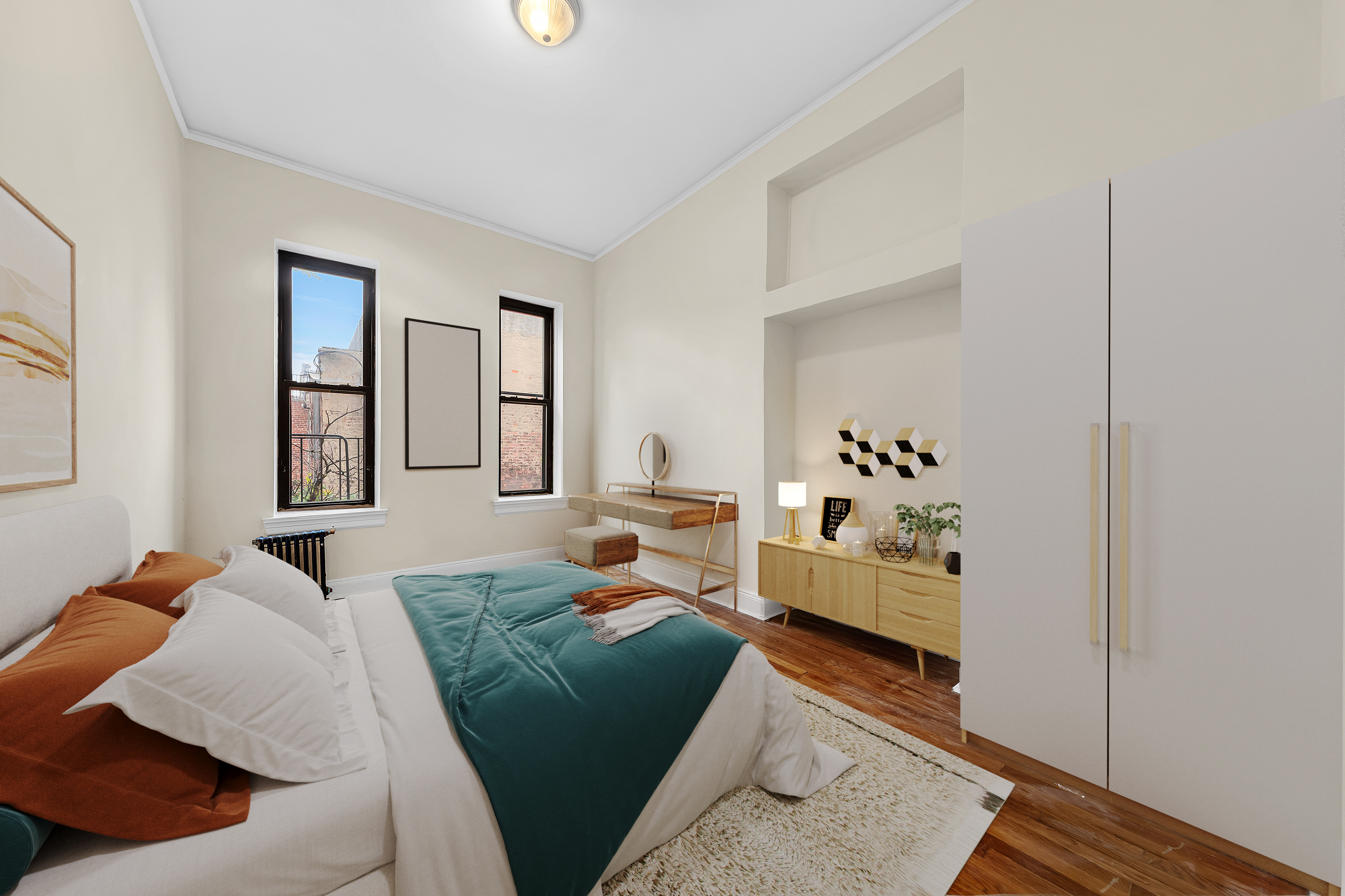 370 Columbus Avenue, Unit PH5 Manhattan, NY 10024 - Photo 4 of 9 a bedroom with a bed and a couch