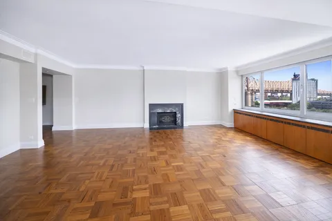 a view of a kitchen with a sink and a stove top oven