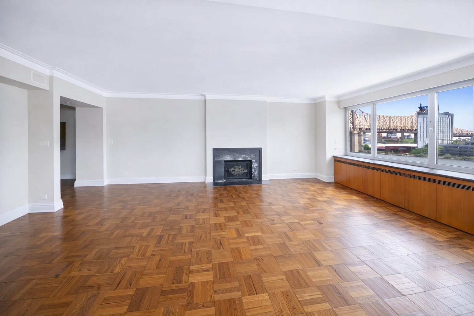 25 Sutton Place South, Unit 8G Manhattan, NY 10022 - Photo 3 of 22 a view of a kitchen with a sink and a stove top oven