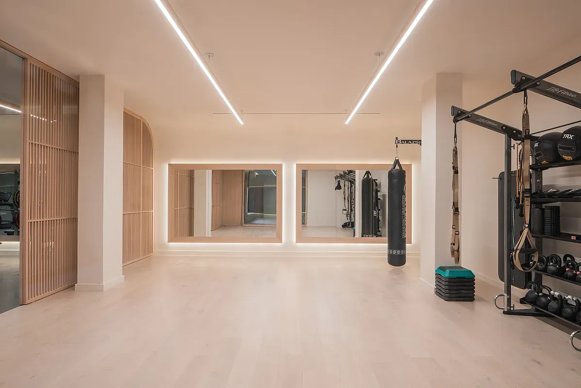 a view of a hallway with living room and furniture