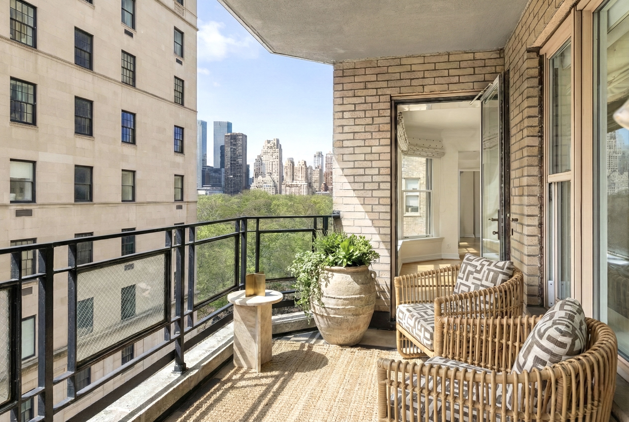 1 East 66th Street, Unit 9EF Manhattan, NY 10065 - Photo 1 of 19 a view of a balcony with chairs