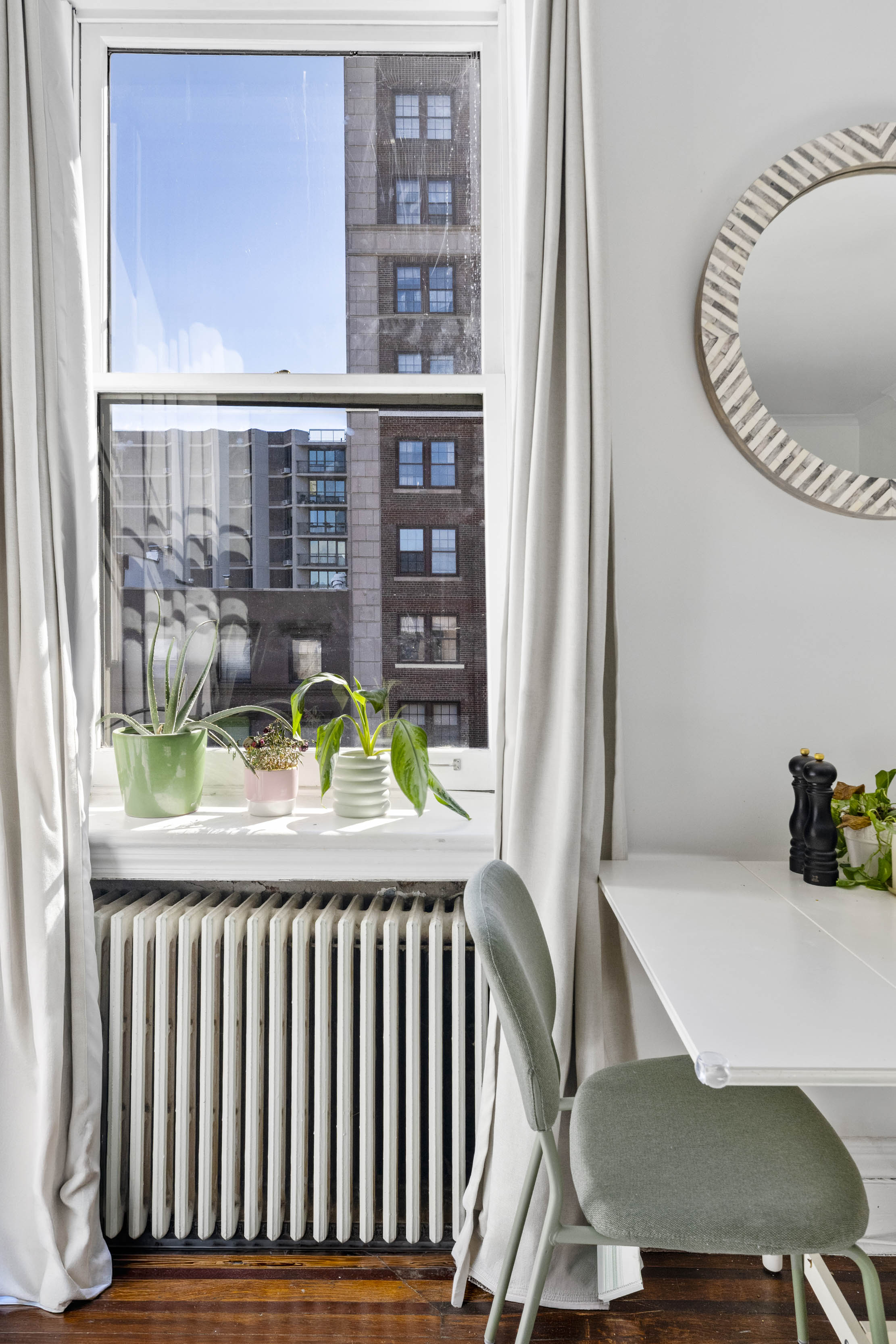 21 Monroe Place, Unit 5F Brooklyn, NY 11201 - Photo 5 of 10 a view of a room that has a bed and a window