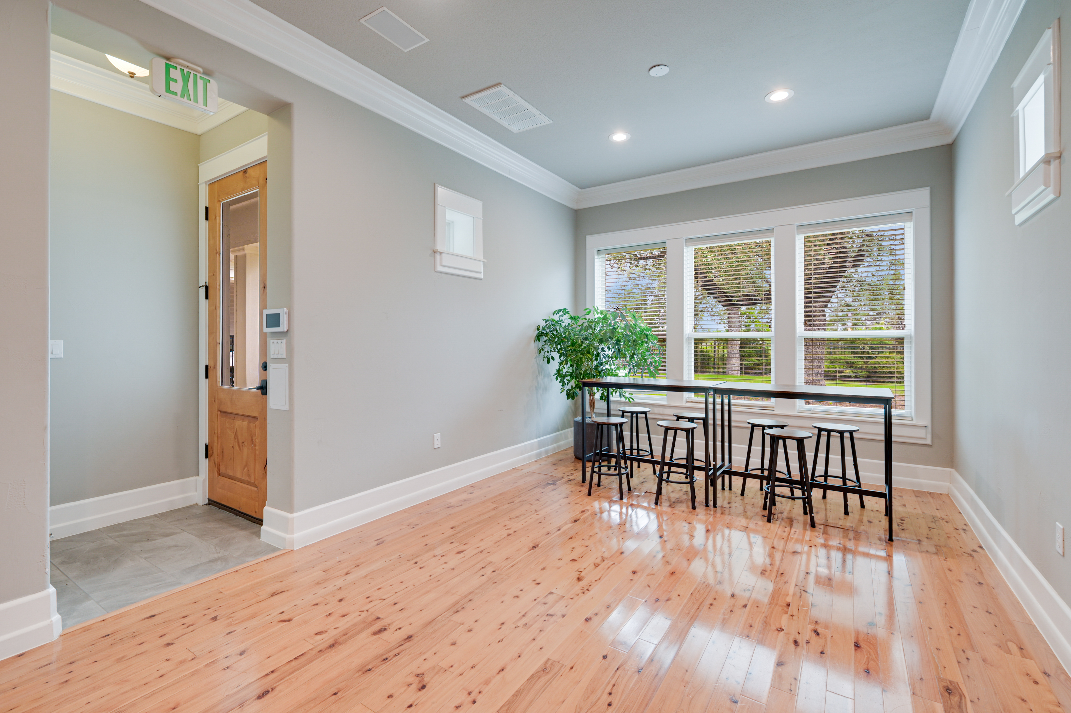 14913 Murfin Road Austin, TX 78734 - Photo 9 of 40 an empty room with wooden floor and windows
