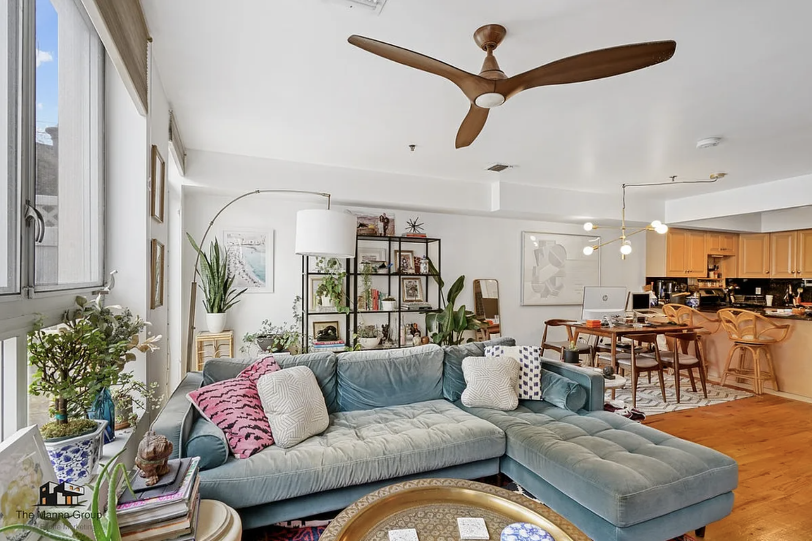 30 Devoe Street, Unit 1B Brooklyn, NY 11211 - Photo 3 of 12 a living room with furniture kitchen view and a chandelier