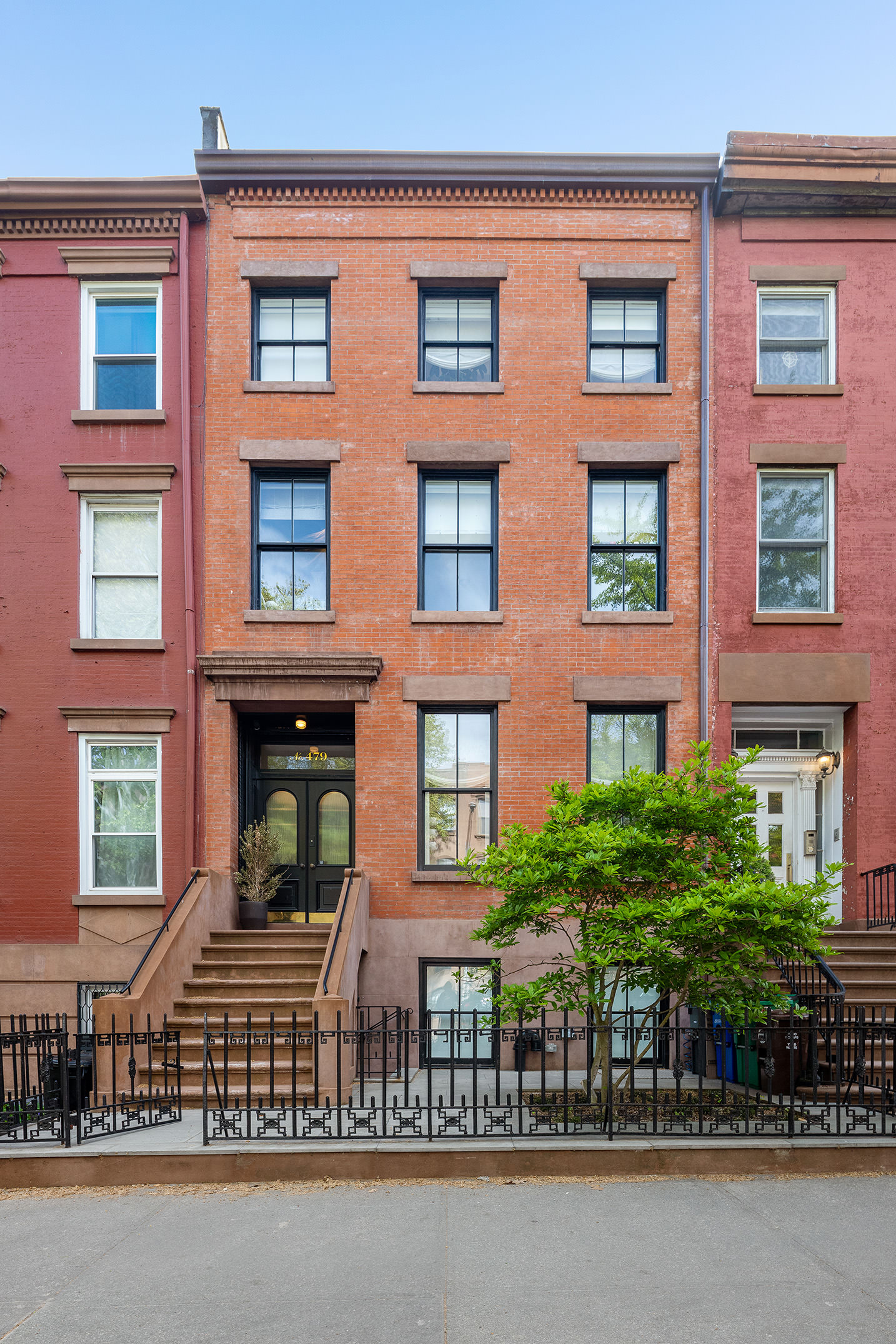479 Henry Street Brooklyn, NY 11231 - Photo 29 of 30 front view of a building with a garden