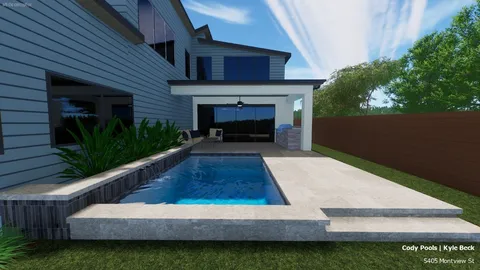 a view of a house with backyard and sitting area
