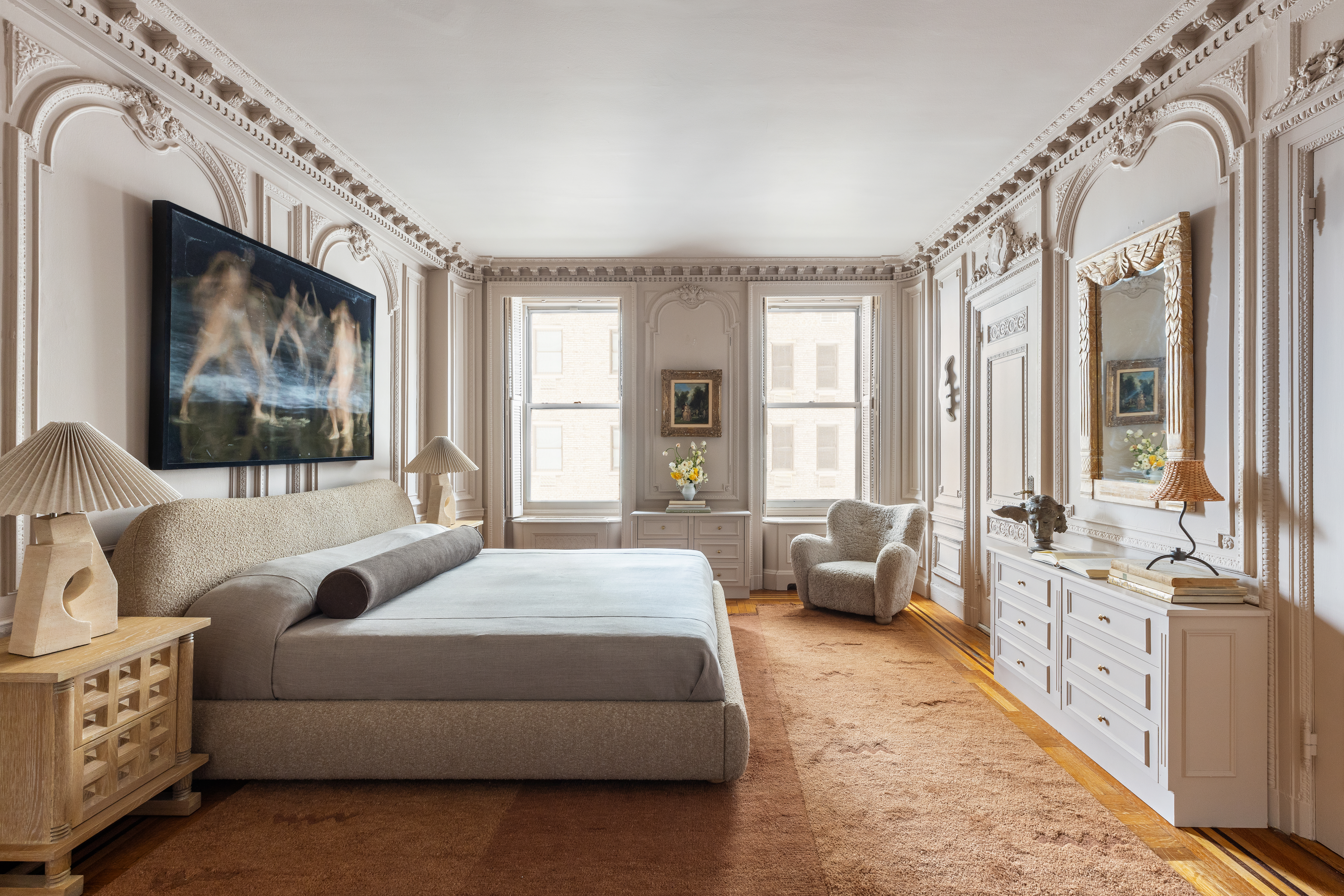 1136 5th Avenue, Unit 6A Manhattan, NY 10128 - Photo 25 of 44 a spacious bedroom with a balcony a bed and a large window