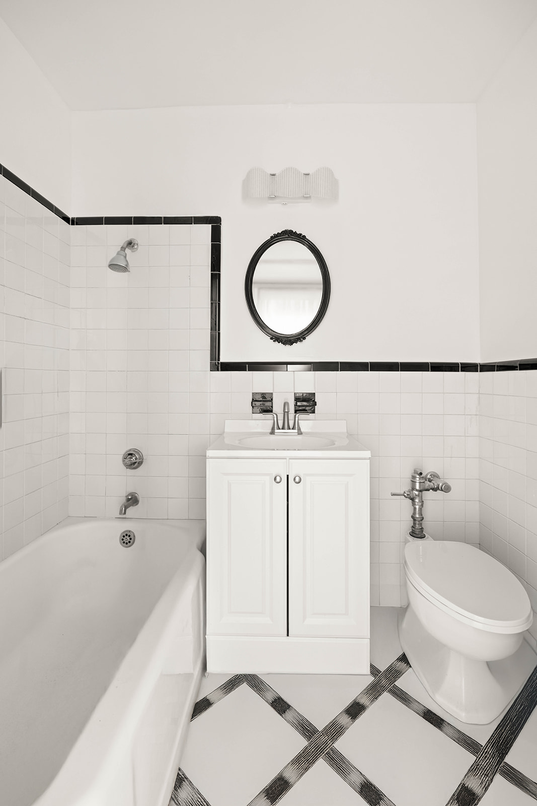 263 West End Avenue, Unit 13F Manhattan, NY 10023 - Photo 14 of 22 a bathroom with a sink toilet a shower and bathtub