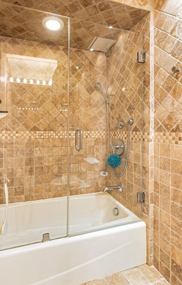 520 East 76th Street, Unit PHC Manhattan, NY 10021 - Photo 14 of 15 a bathroom with a bathtub and shower