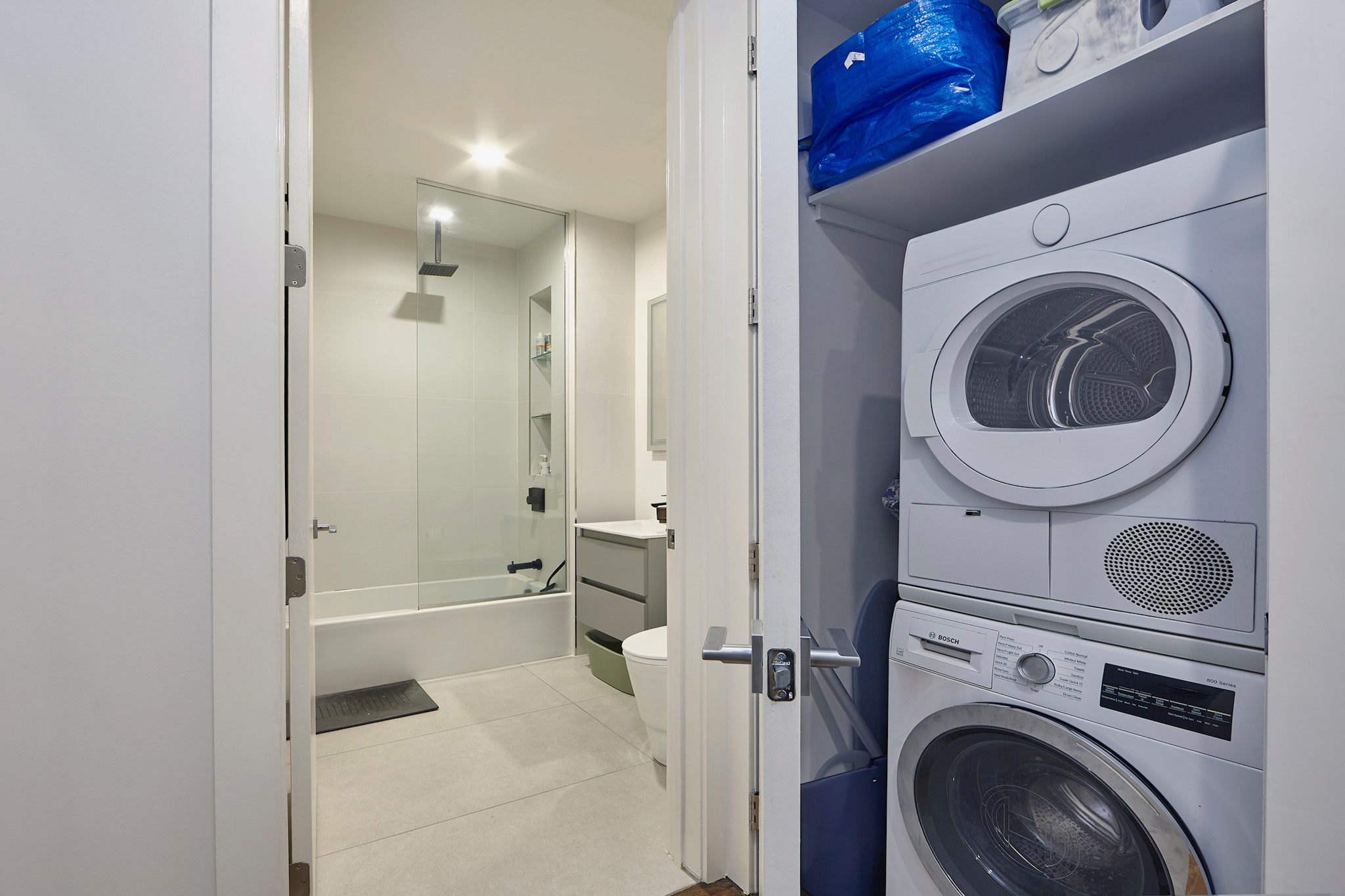 144 North 10th Street, Unit 2D Brooklyn, NY 11249 - Photo 9 of 12 a view of a hallway with washer and dryer