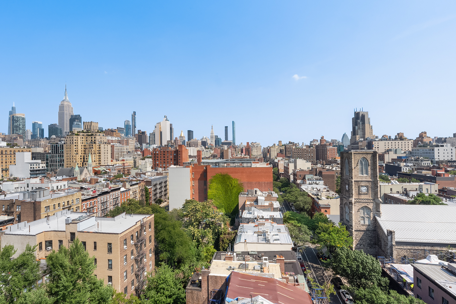 365 West 20th Street, Unit 14B Manhattan, NY 10011 - Photo 16 of 21 a view of a city with tall buildings