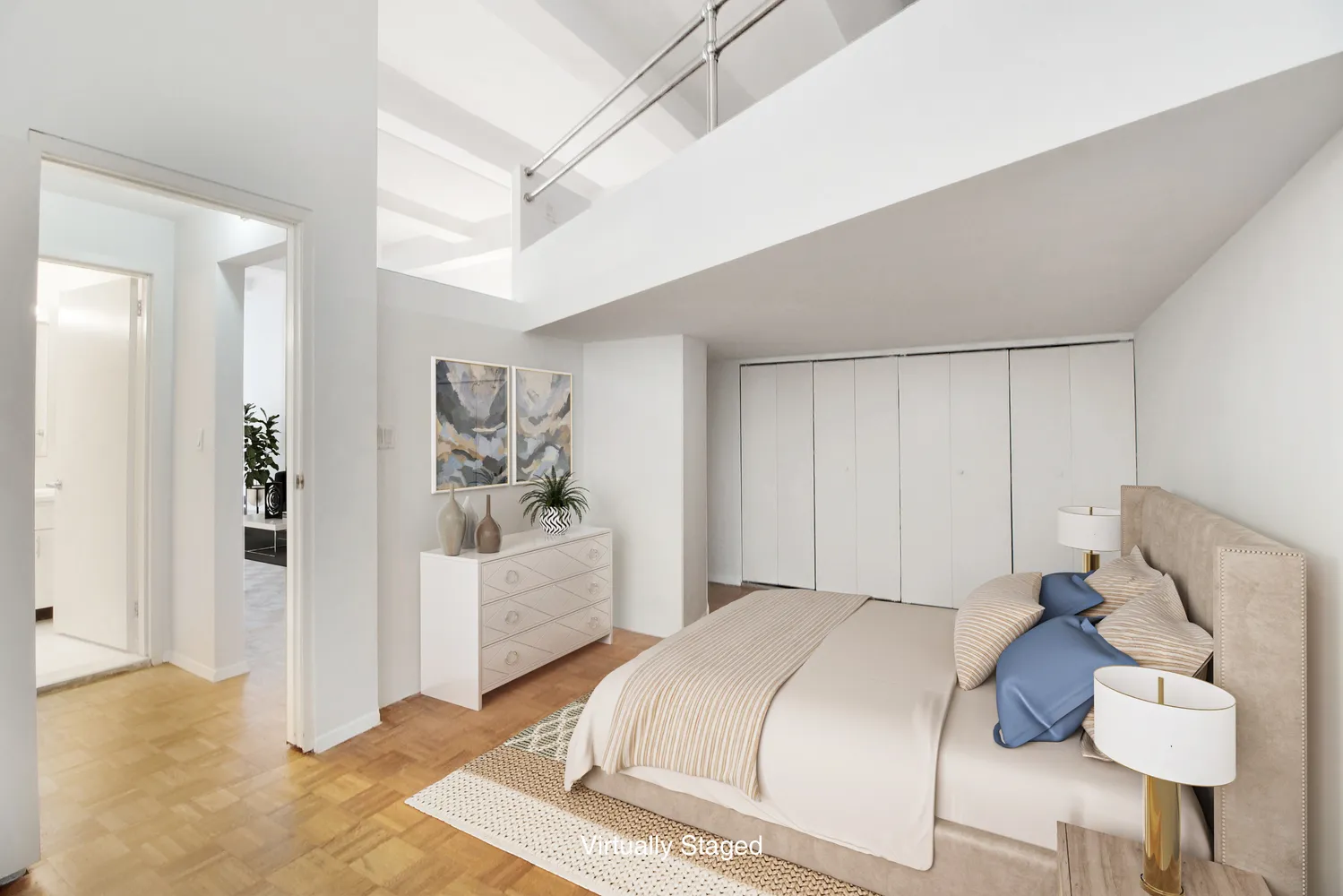 a bedroom with a bed and a couch