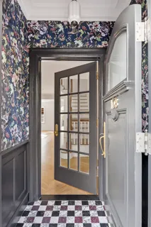 a kitchen with granite countertop a sink dishwasher stove and cabinets