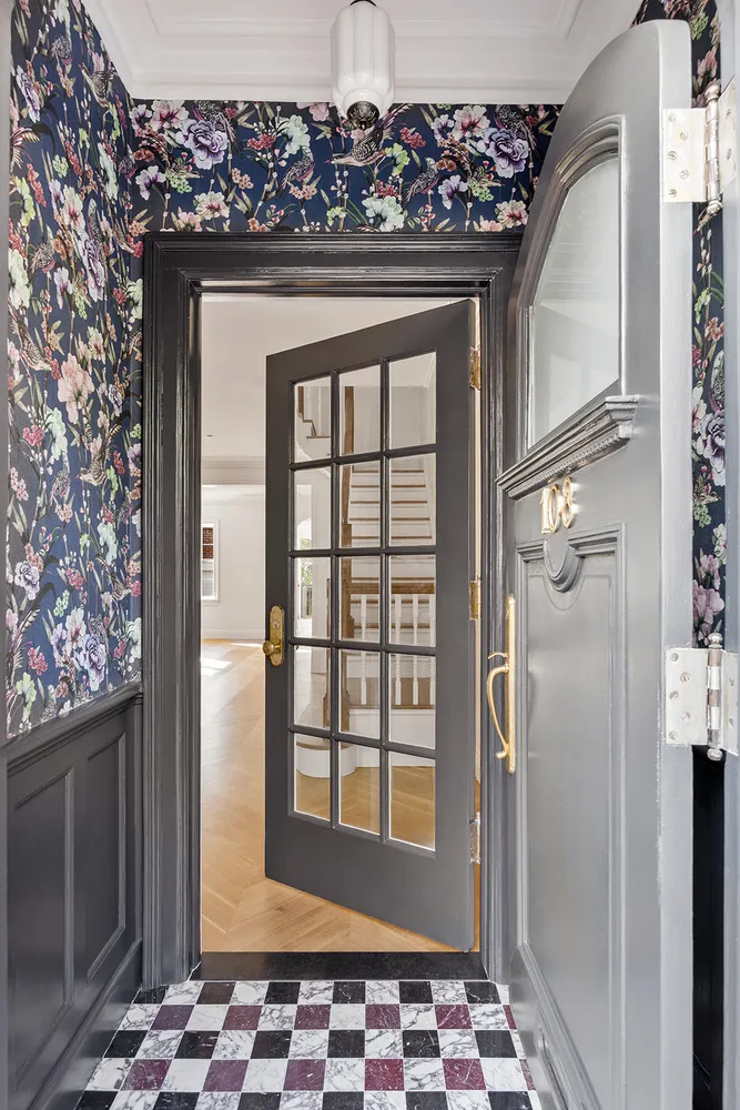 a kitchen with granite countertop a sink dishwasher stove and cabinets