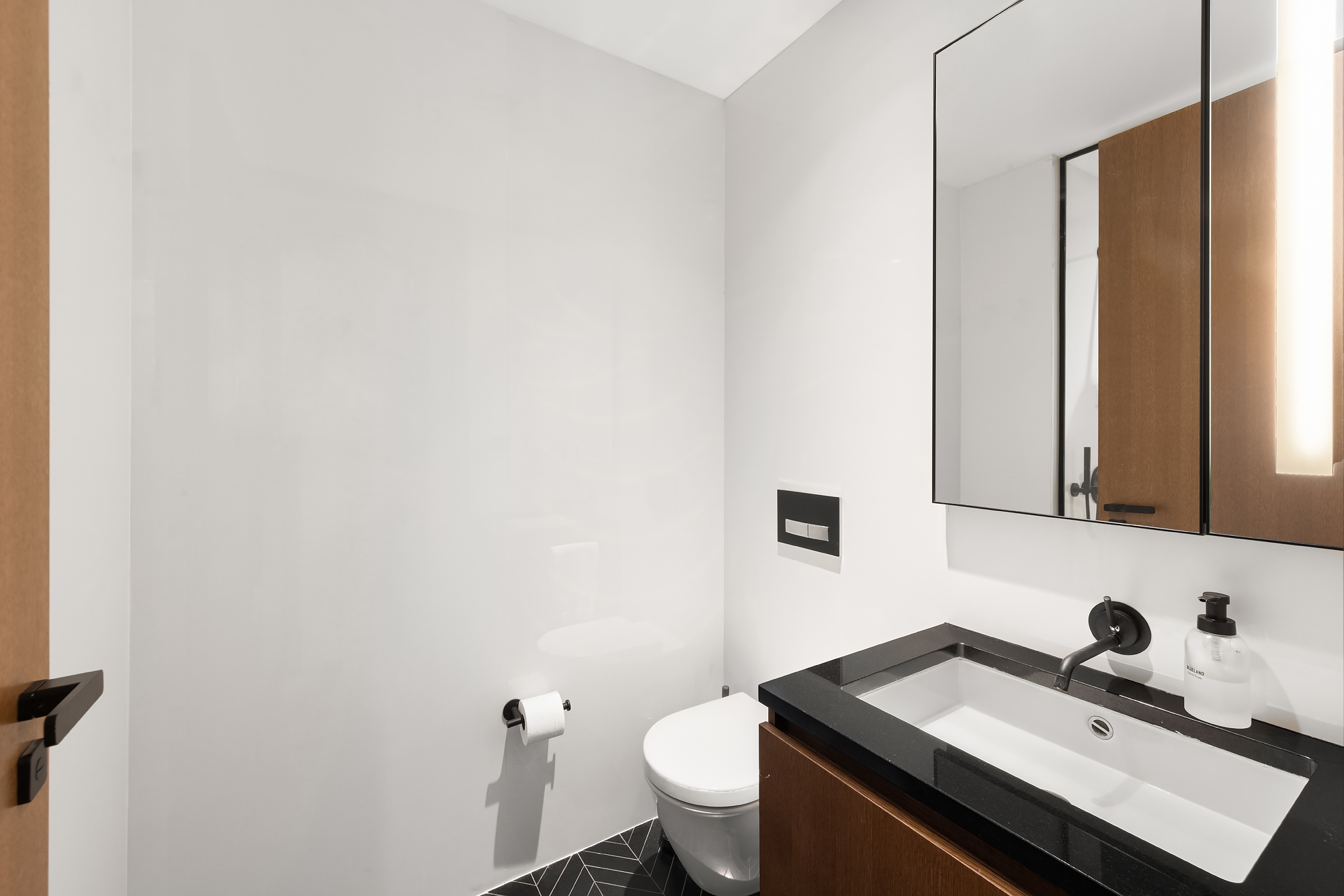 570 Broome Street, Unit 6A Manhattan, NY 10013 - Photo 9 of 17 a bathroom with a sink and a toilet