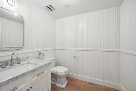 a view of a pathway with a house in the background