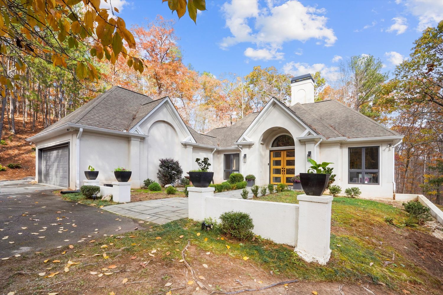 a front view of a house with a yard