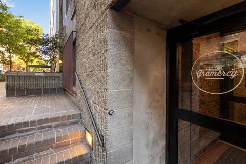 a picture of a bathroom with a small window