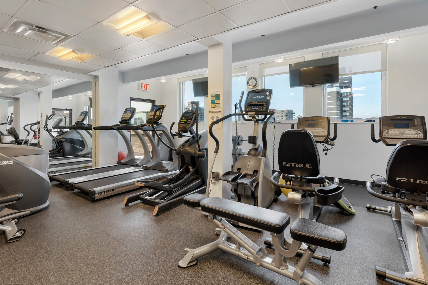 250 East 87th Street, Unit 6E Manhattan, NY 10128 - Photo 9 of 12 a view of a room with gym equipment