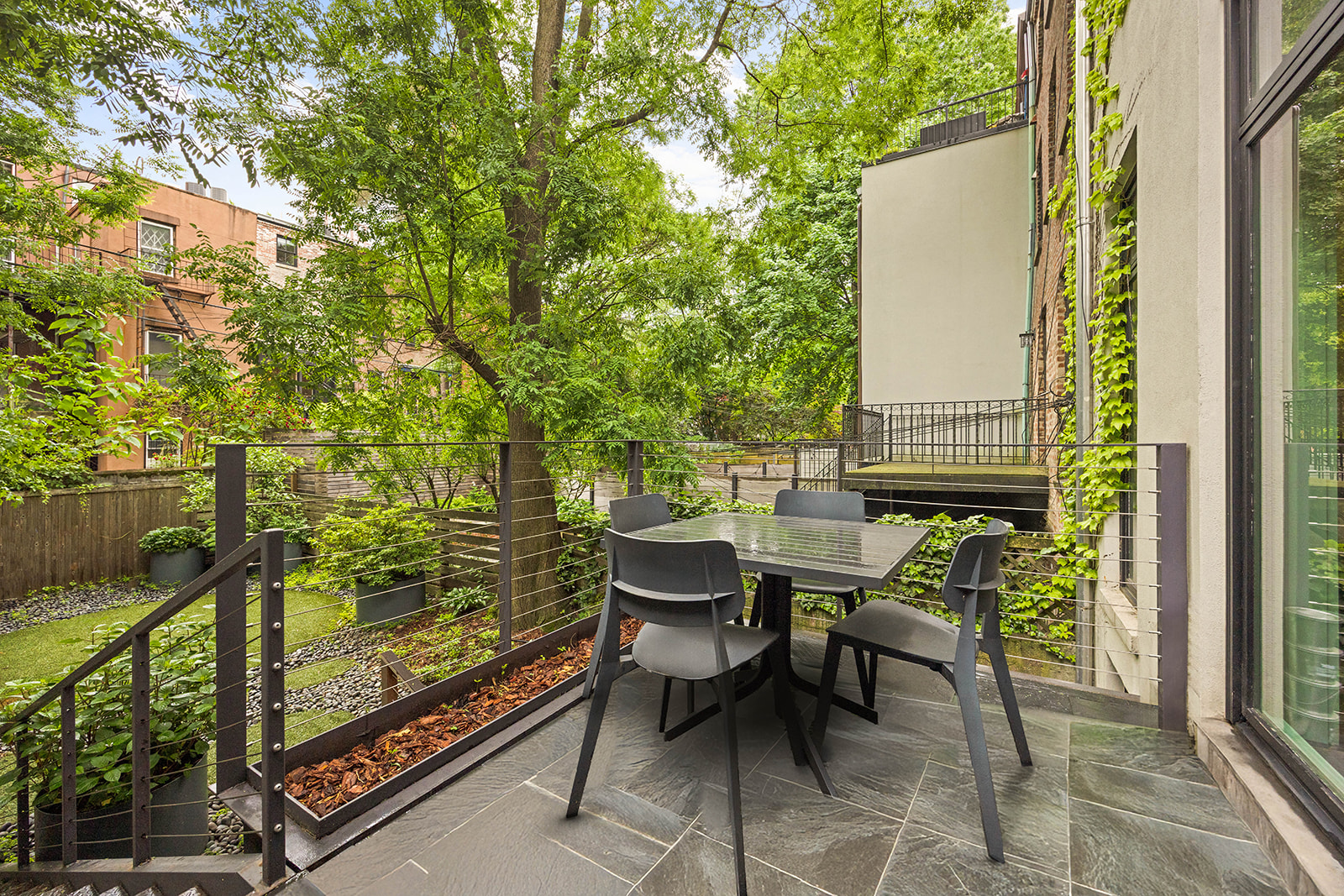 229 Dean Street Brooklyn, NY 11217 - Photo 8 of 23 a view of chairs and table in the balcony