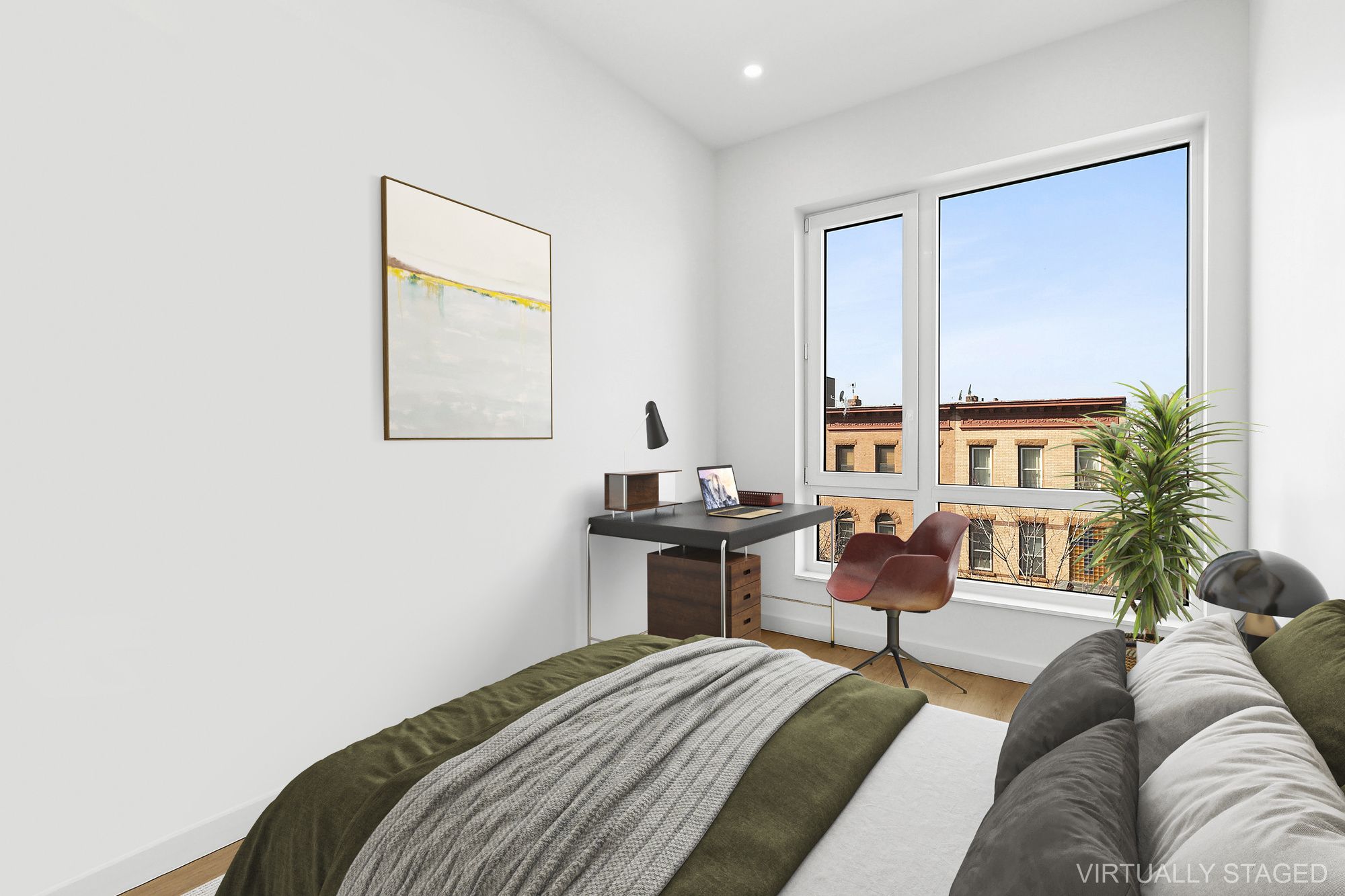 138 Schaefer Street, Unit 3A Brooklyn, NY 11207 - Photo 6 of 10 a bedroom with a bed and wooden floor