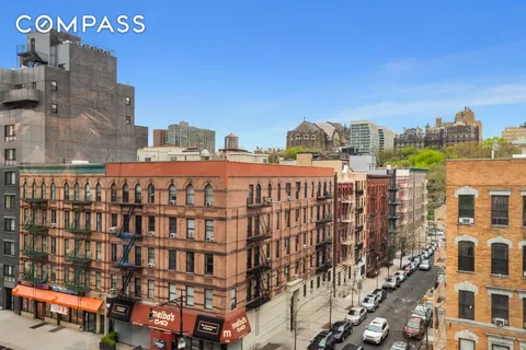 a view of a large building with a city view