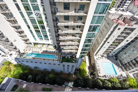 a view of a lake with a building in the background