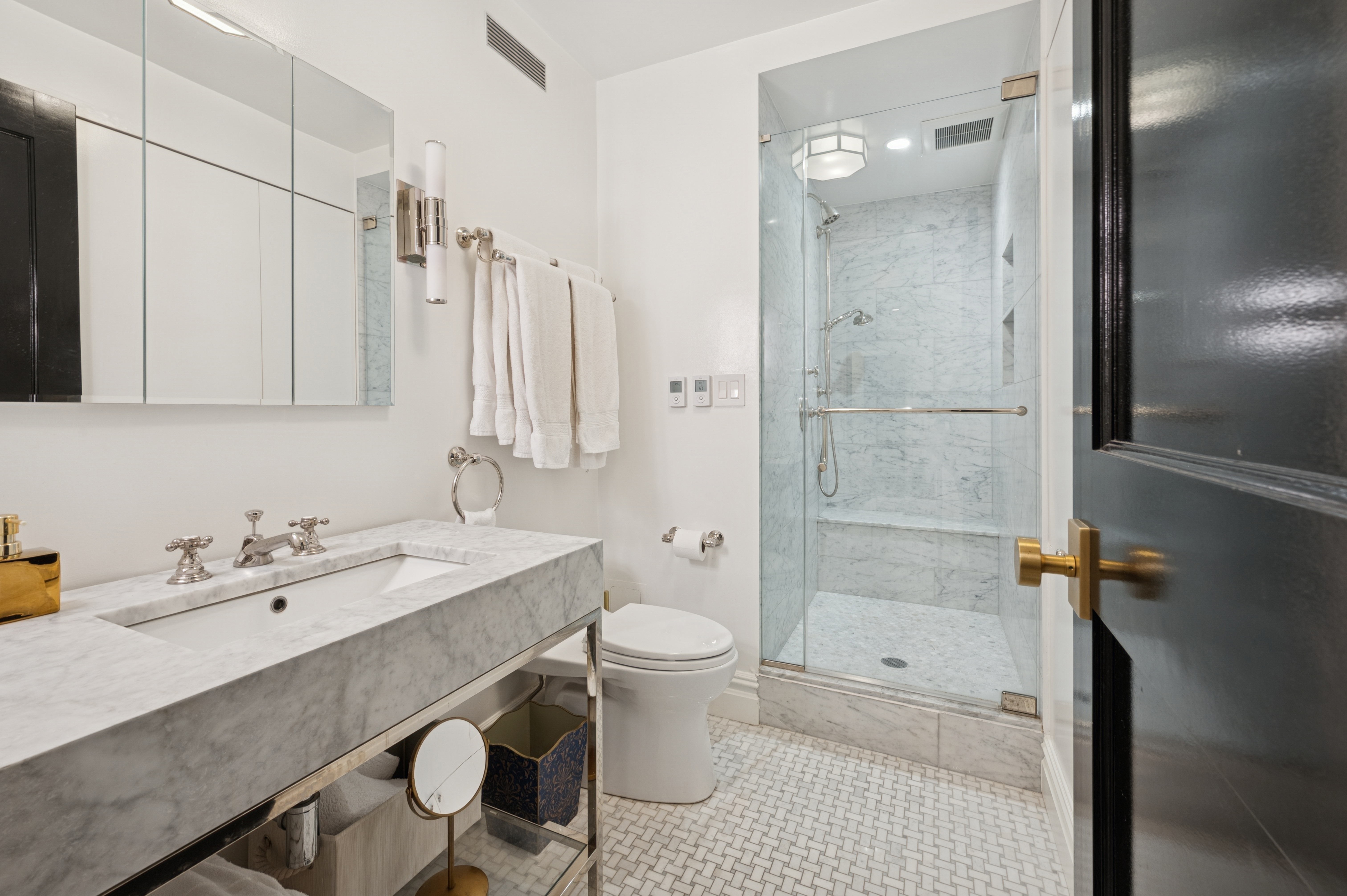 891 Park Avenue, Unit 10 Manhattan, NY 10075 - Photo 16 of 27 a bathroom with a sink toilet and shower