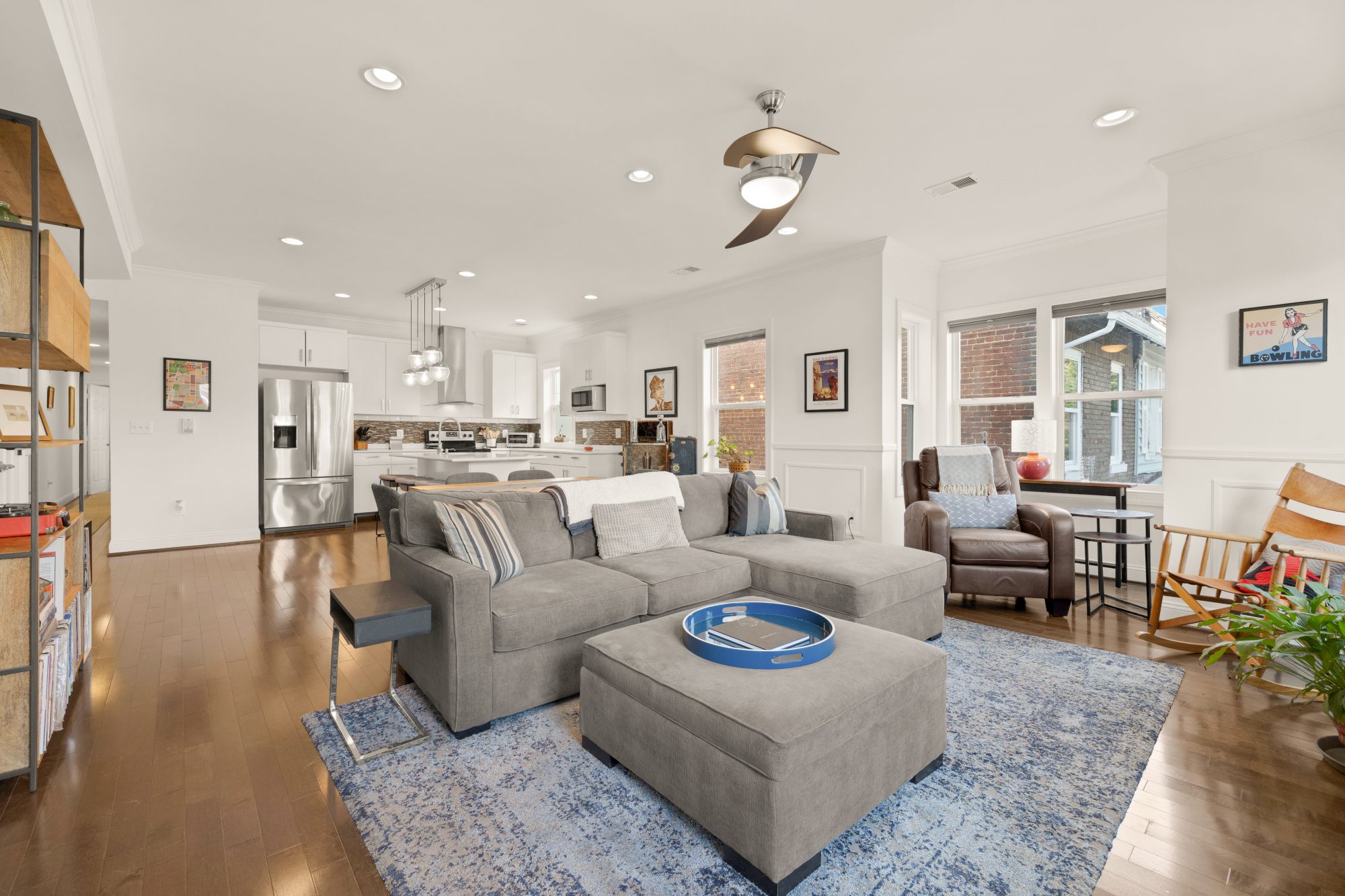 233 S Street Northeast, Unit 4 Washington, DC 20002 - Photo 5 of 37 a living room with furniture kitchen view and a dining table