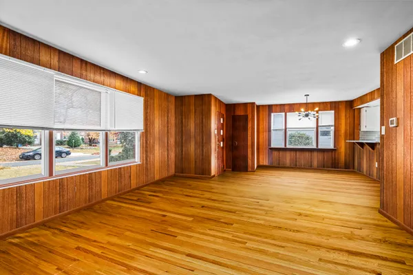 a view of a room with a large window