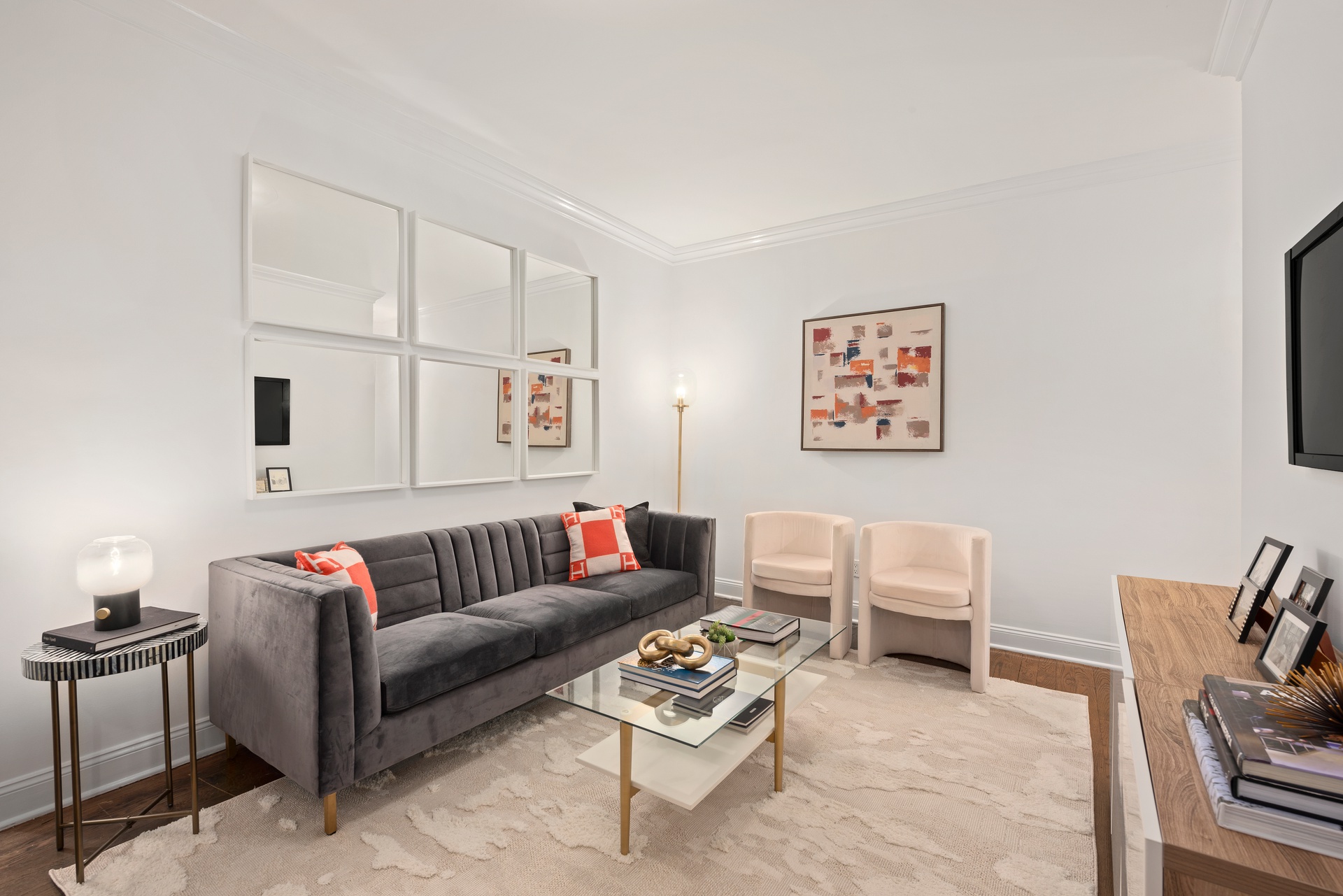 65 Morton Street, Unit 2N Manhattan, NY 10014 - Photo 3 of 12 a living room with furniture a rug and a window