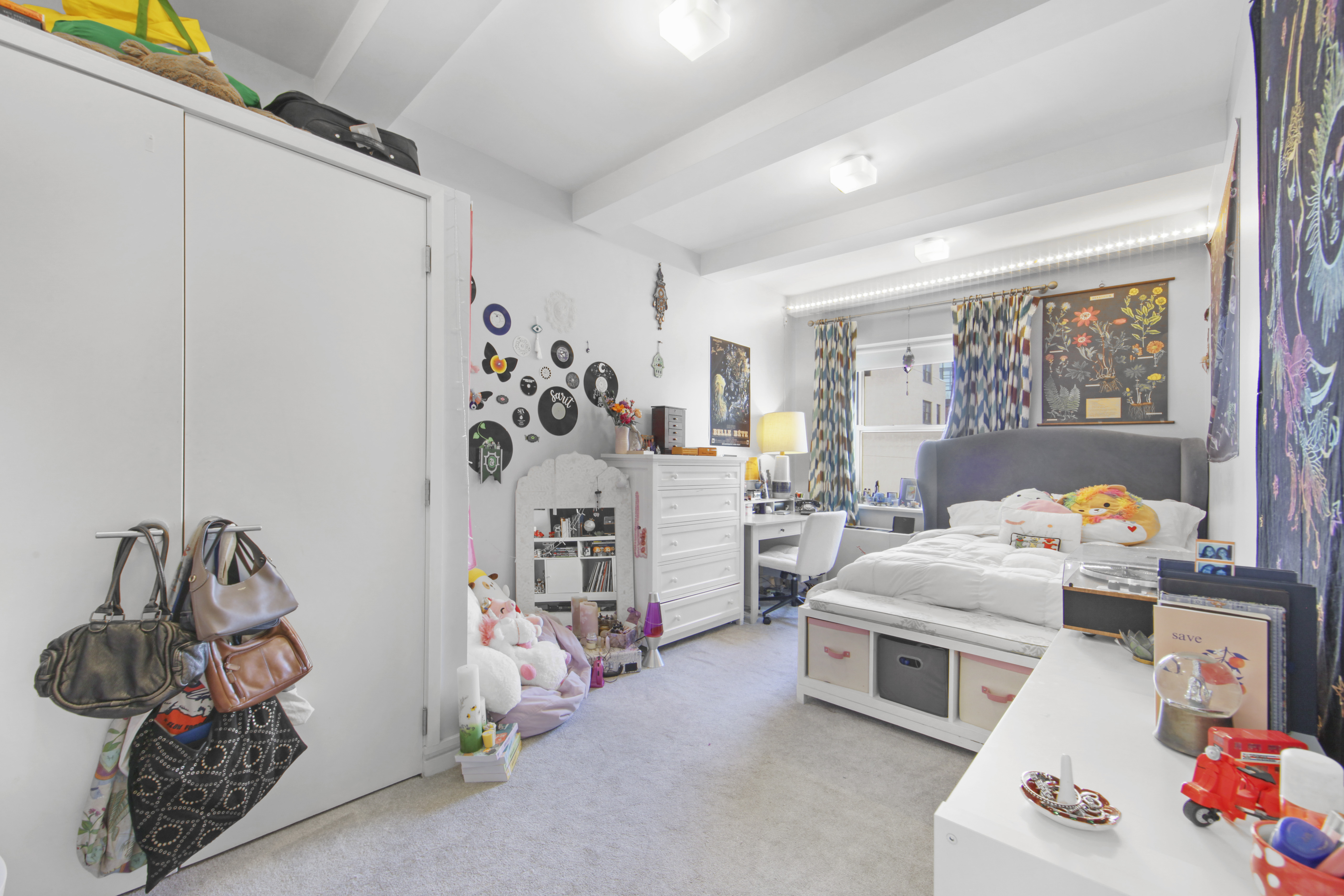 18 East 12th Street, Unit 7BC Manhattan, NY 10003 - Photo 15 of 26 a bedroom with a bed and a window