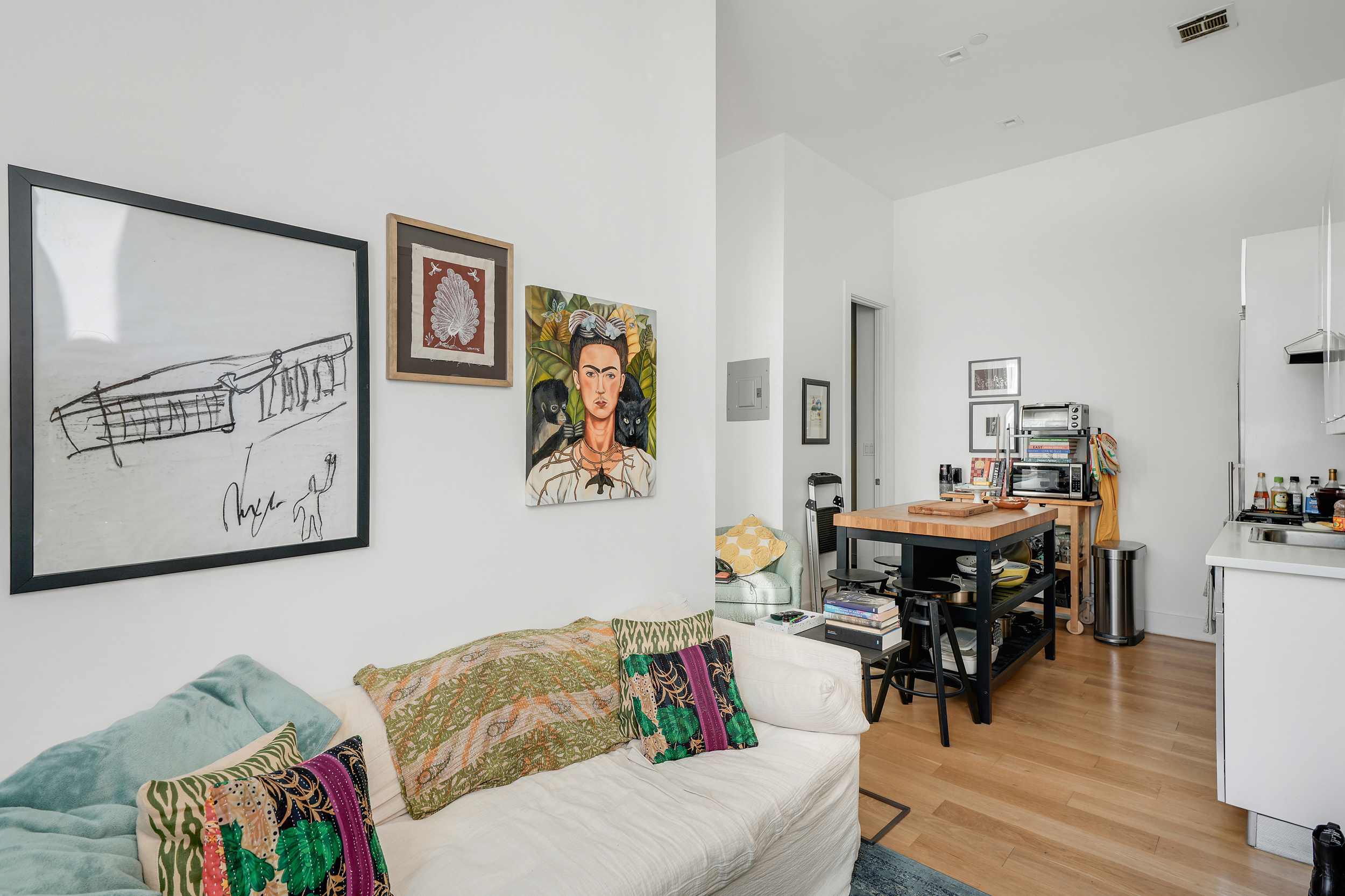 622 Grand Avenue, Unit 102 Brooklyn, NY 11238 - Photo 4 of 13 a living room with furniture and wooden floor