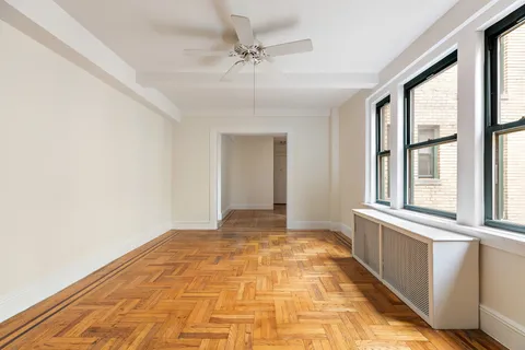 a view of an empty room with a window