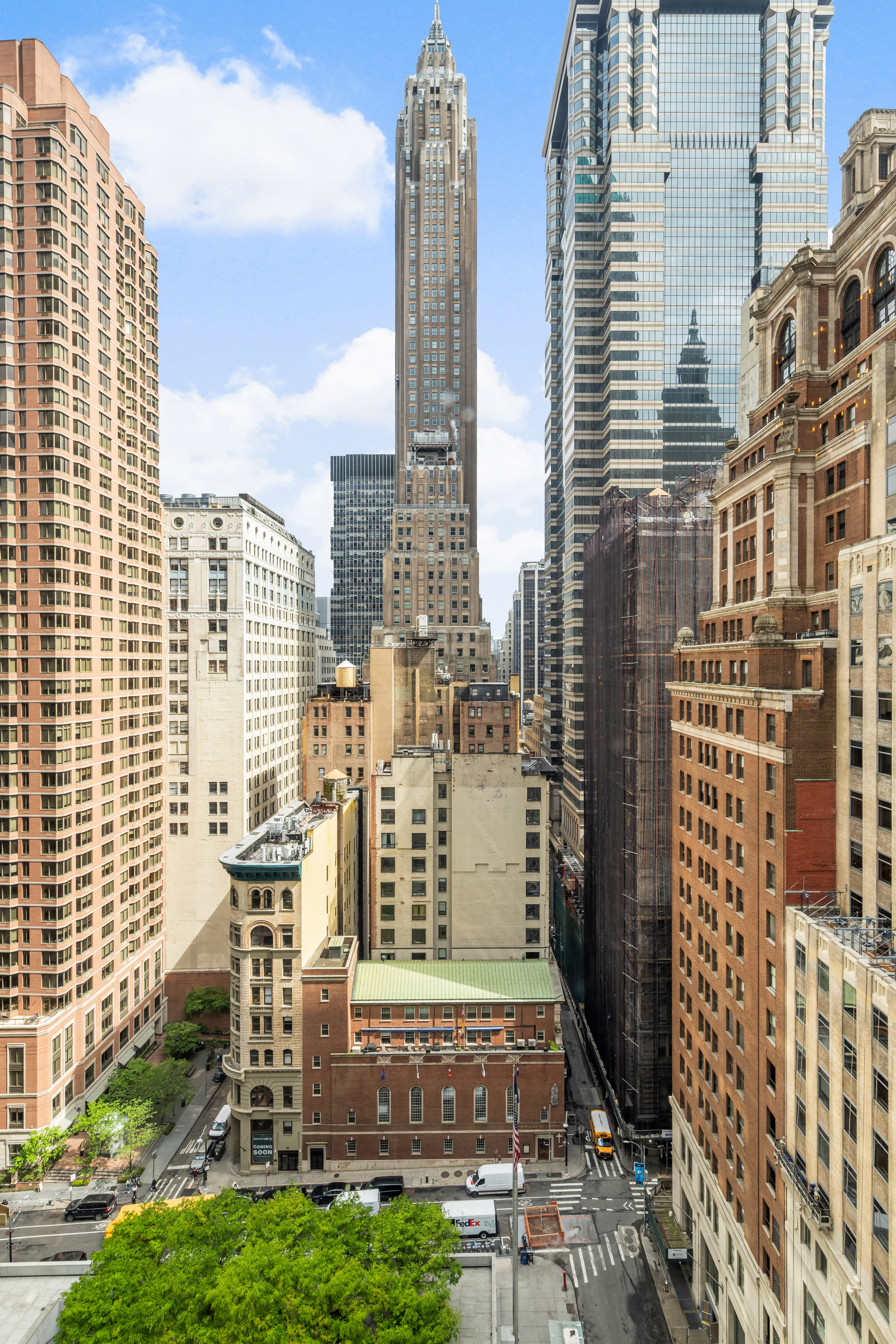 20 Pine Street, Unit 1802 Manhattan, NY 10005 - Photo 9 of 10 a view of a city with tall buildings