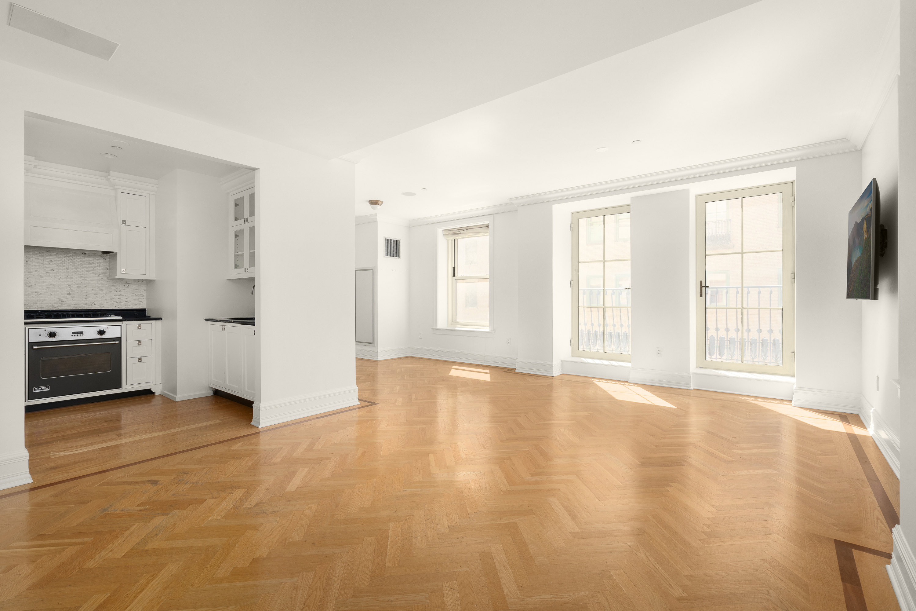 a view of an empty room with a window