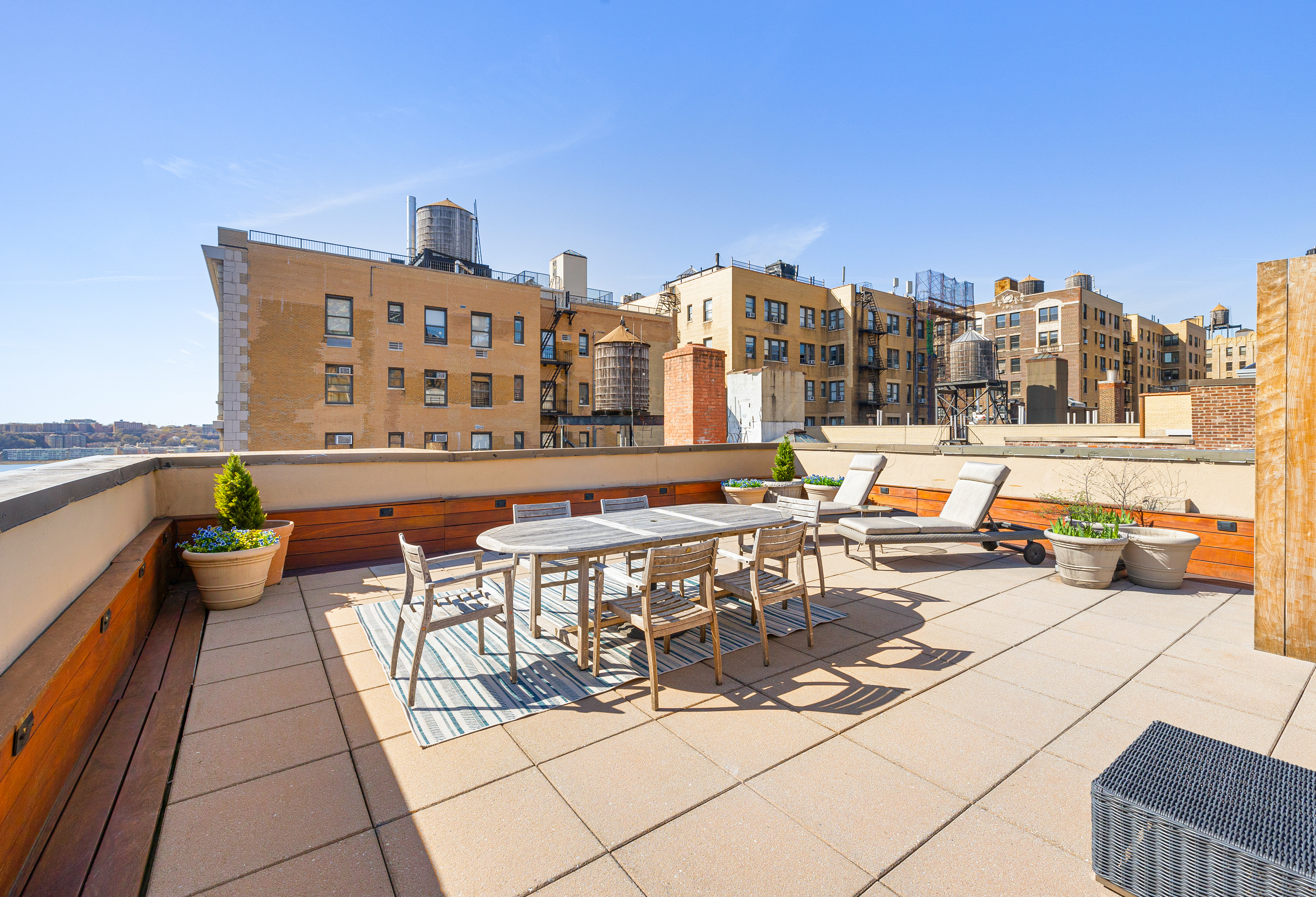 315 West 99th Street, Unit PHA Manhattan, NY 10025 - Photo 2 of 17 a terrace with outdoor seating and city view