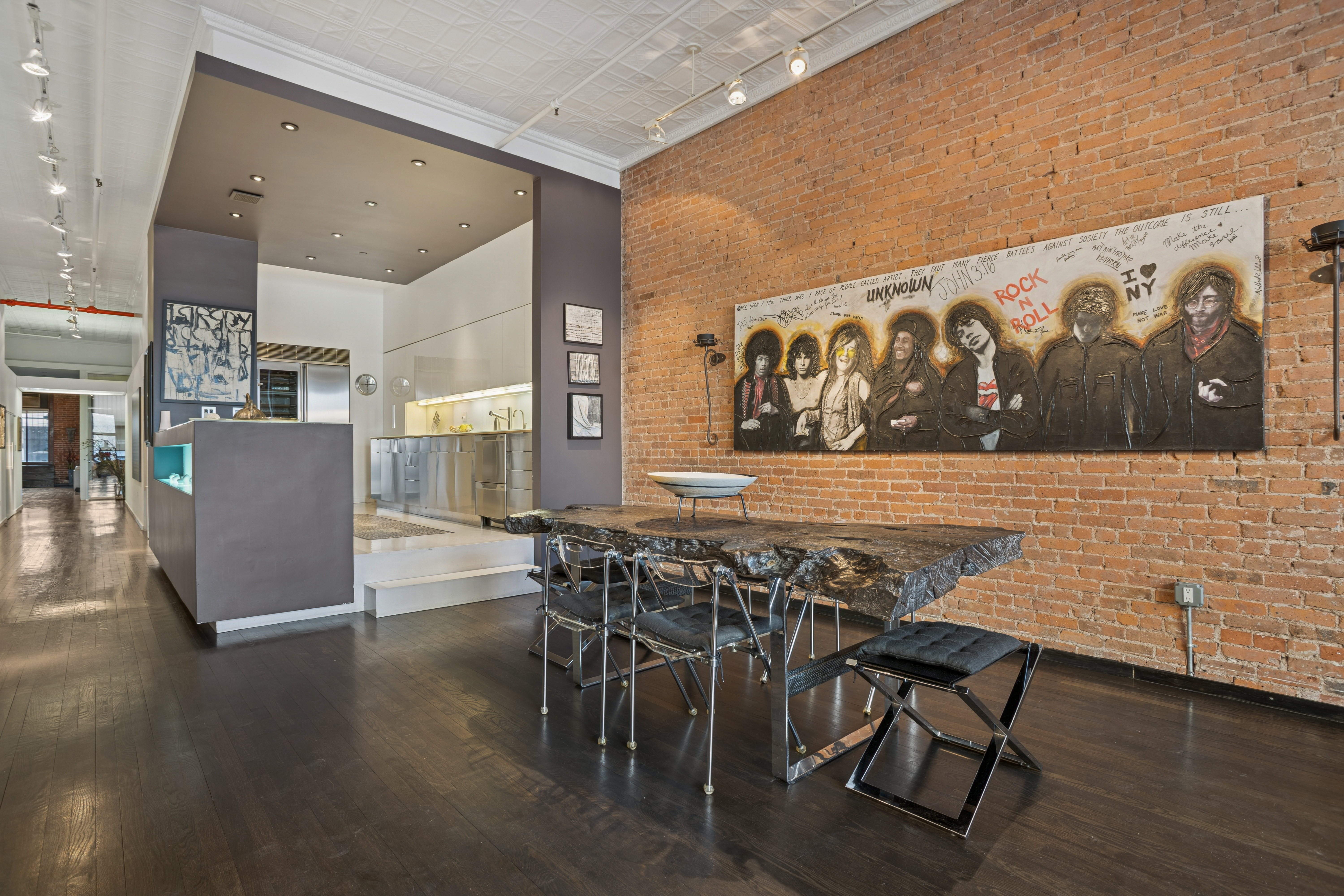 716 Broadway Manhattan, NY 10003 - Photo 2 of 15 a view of a dining room with furniture and wooden floor