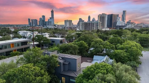 a view of a city with tall buildings