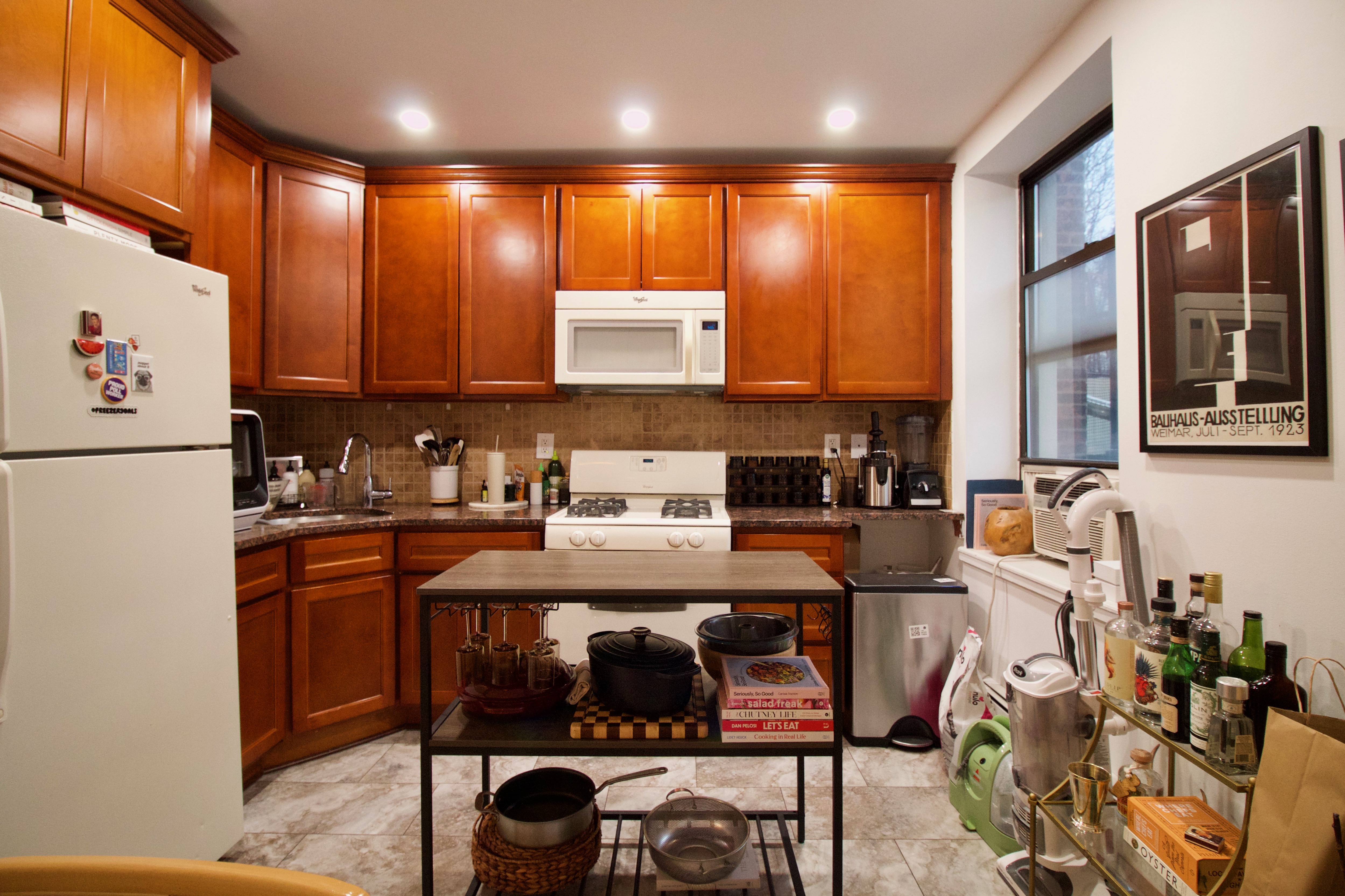 134 Union Street, Unit 2R Brooklyn, NY 11231 - Photo 3 of 23 a kitchen with stainless steel appliances granite countertop a refrigerator a sink a stove and a microwave