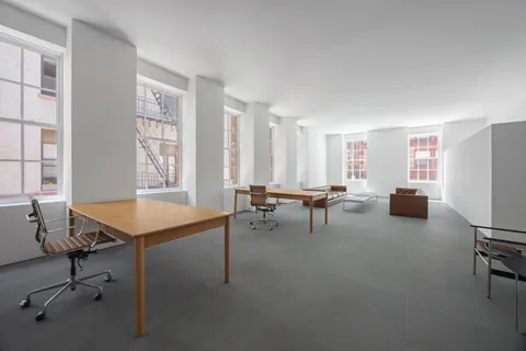 a room with furniture and windows