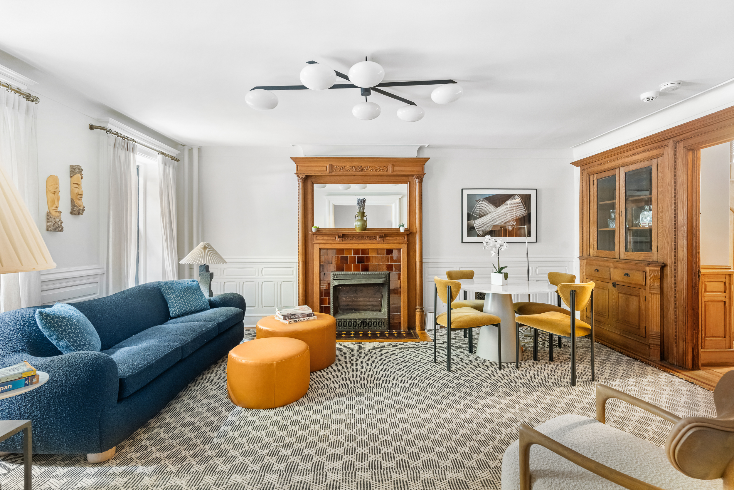 479 4th Street, Unit GARDEN Brooklyn, NY 11215 - Photo 2 of 8 a living room with furniture and a fireplace