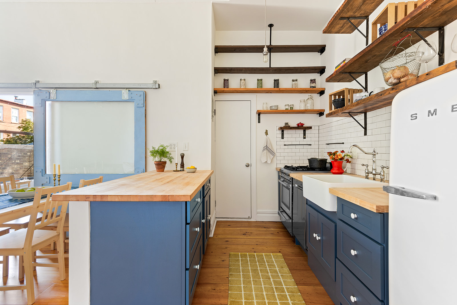 237 Hancock Street, Unit 5 Brooklyn, NY 11216 - Photo 2 of 8 a kitchen that has a lot of cabinets in it