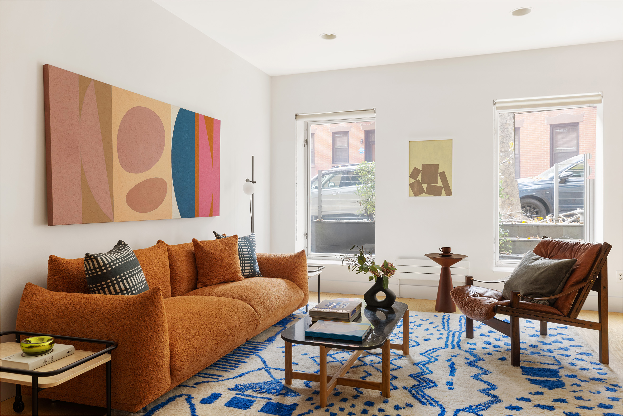 321 Union Street, Unit 1B Brooklyn, NY 11231 - Photo 4 of 10 a living room with furniture and a window