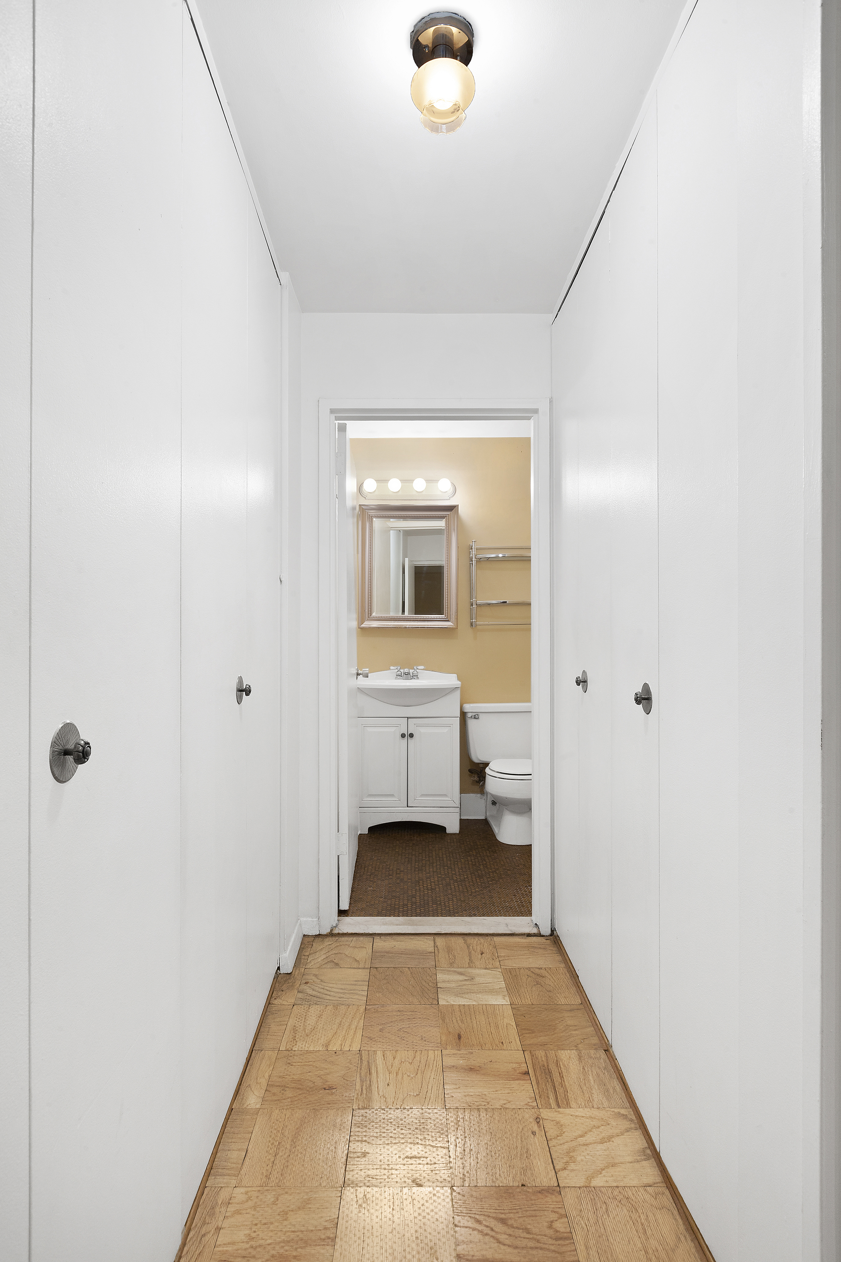 244 Madison Avenue, Unit 4B Manhattan, NY 10016 - Photo 4 of 10 a bathroom with a sink and a mirror