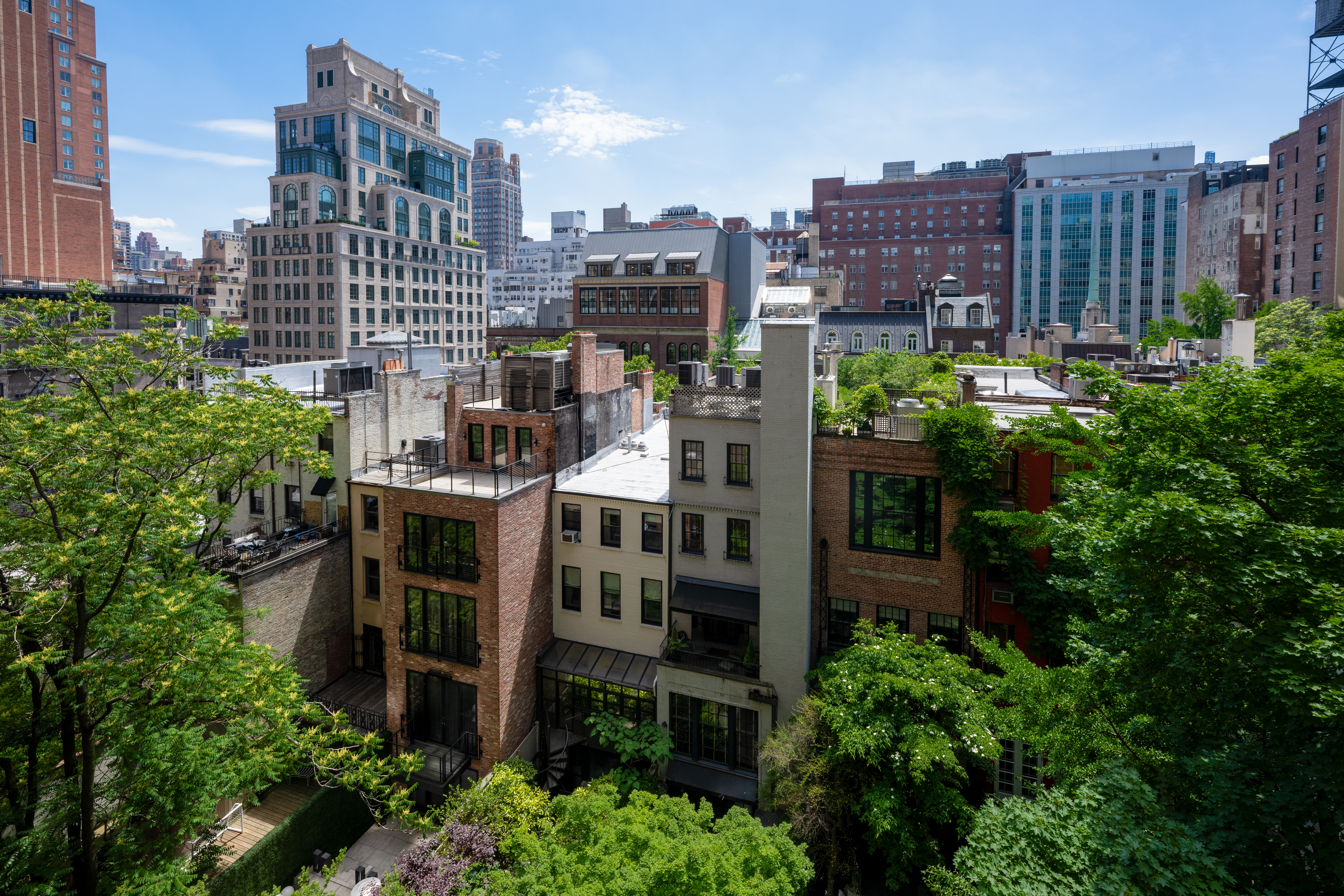 124 East 79th Street, Unit 7D Manhattan, NY 10075 - Photo 17 of 26 a view of a city that has tall buildings
