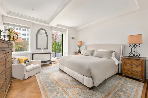 a bed room with a bed and a couch