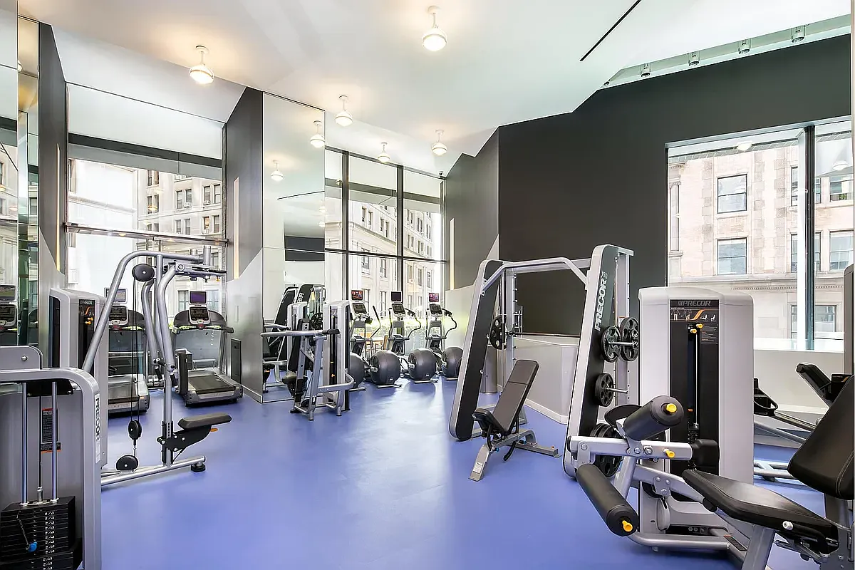 15 William Street, Unit 21A Manhattan, NY 10005 - Photo 12 of 19 a view of a room with gym equipment