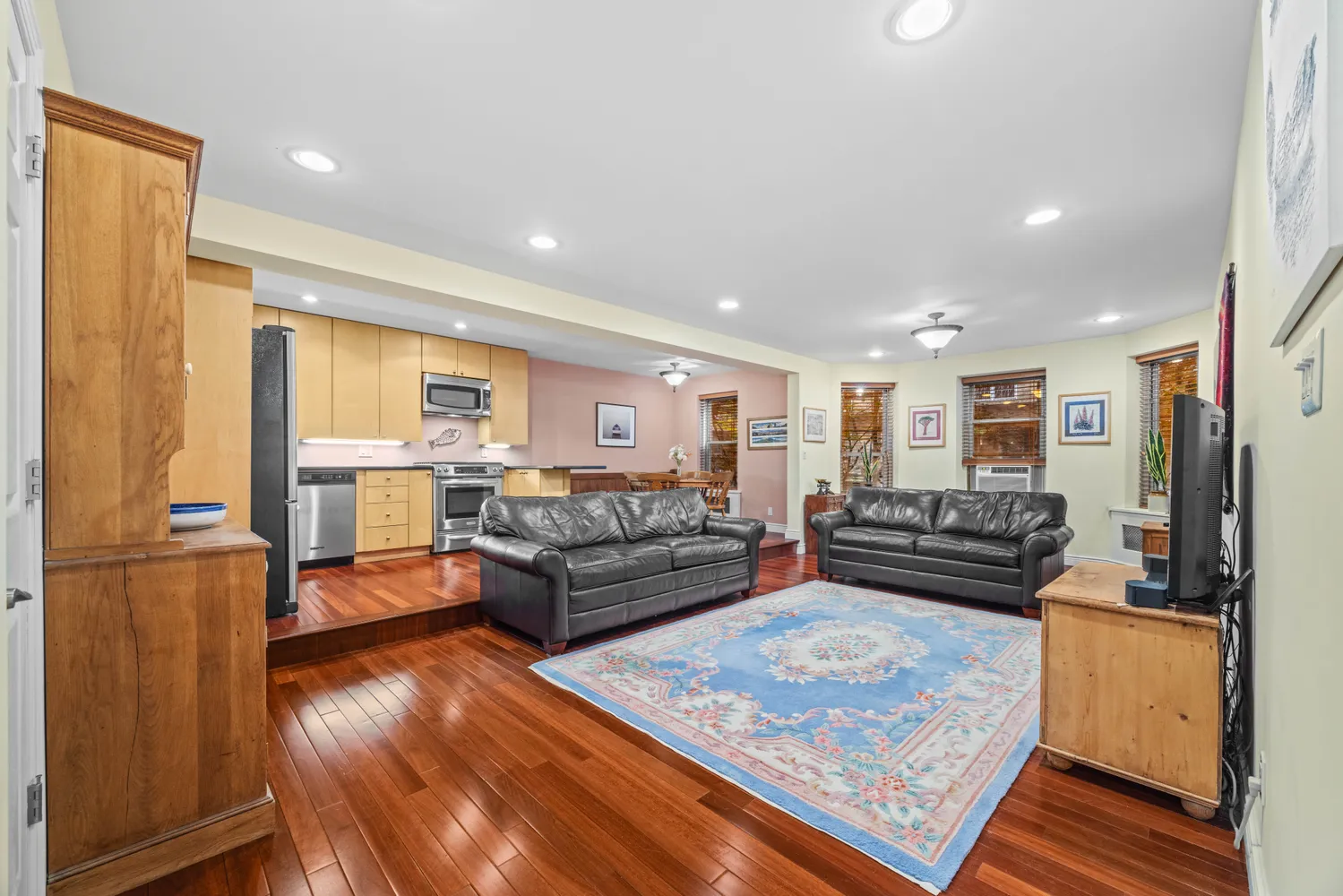a living room with furniture and a table